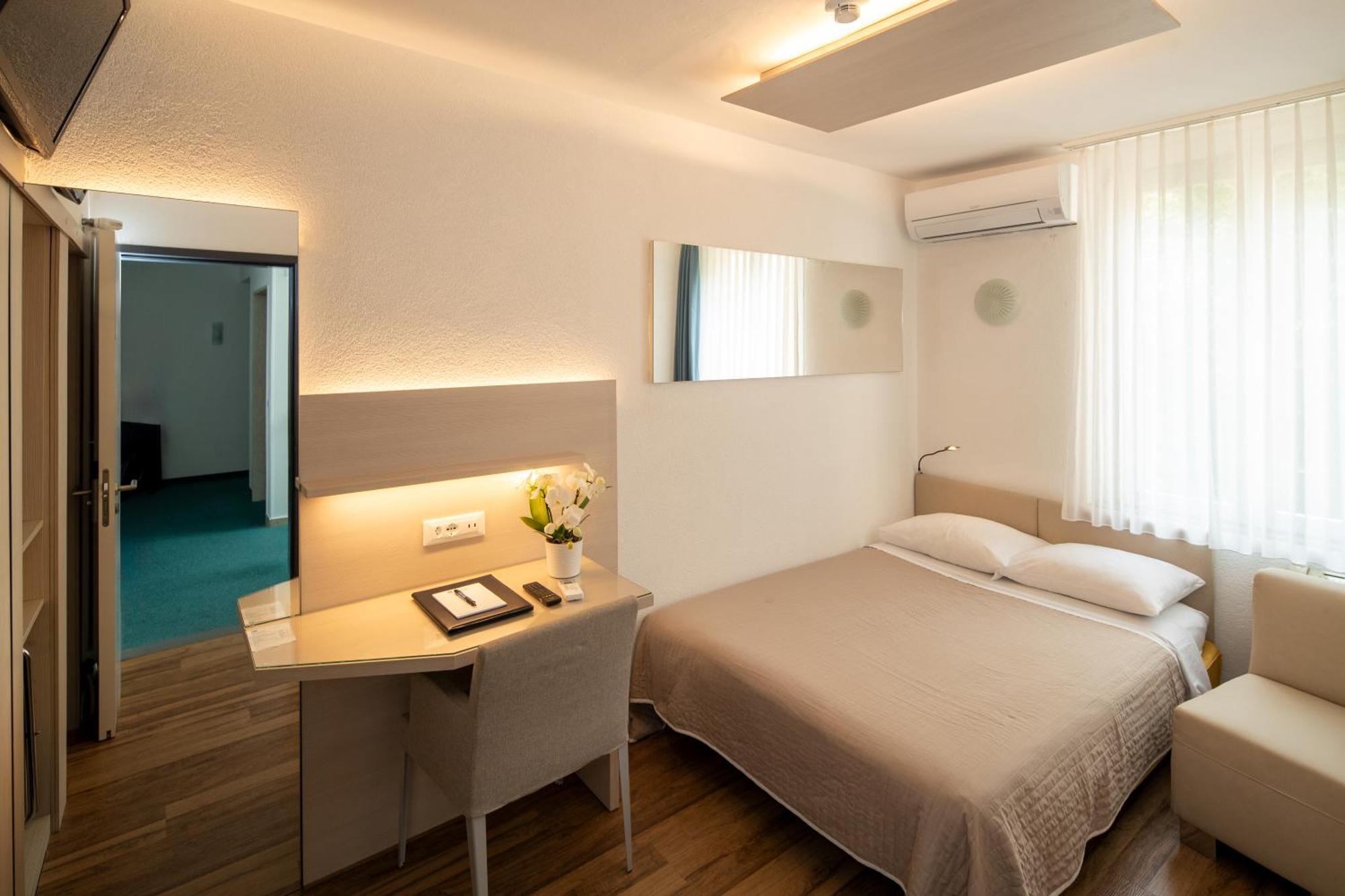 Hotel Campione Bissone Bagian luar foto
