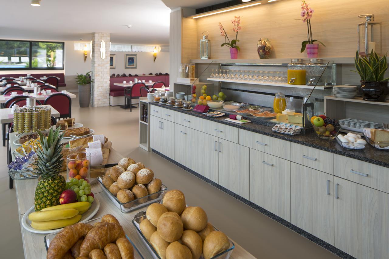 Hotel Campione Bissone Bagian luar foto